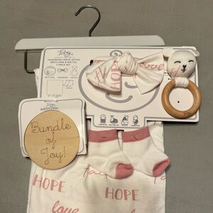 Brand new never used Toby headband, wrap, socks, birth disc & rattle 5 piece set